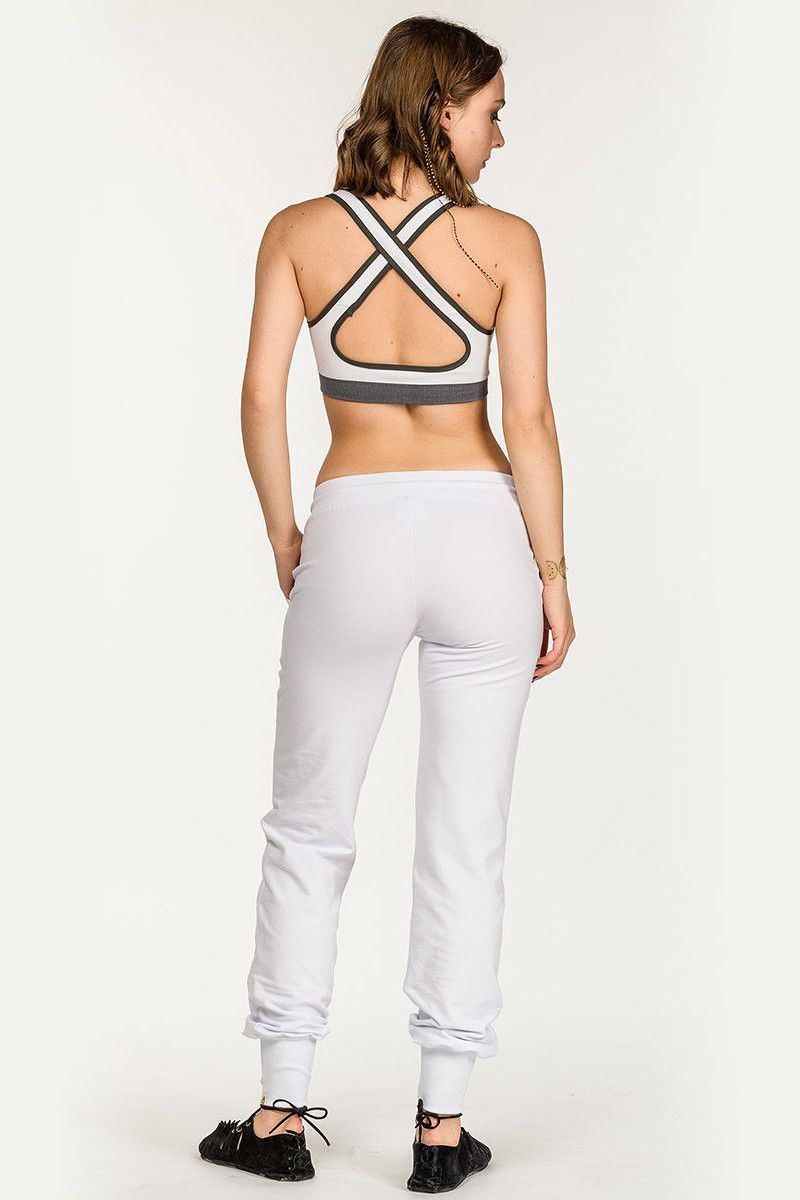 Белые спортивные штаны Якобея